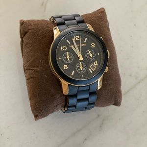 Black and gold Michael kors watch
